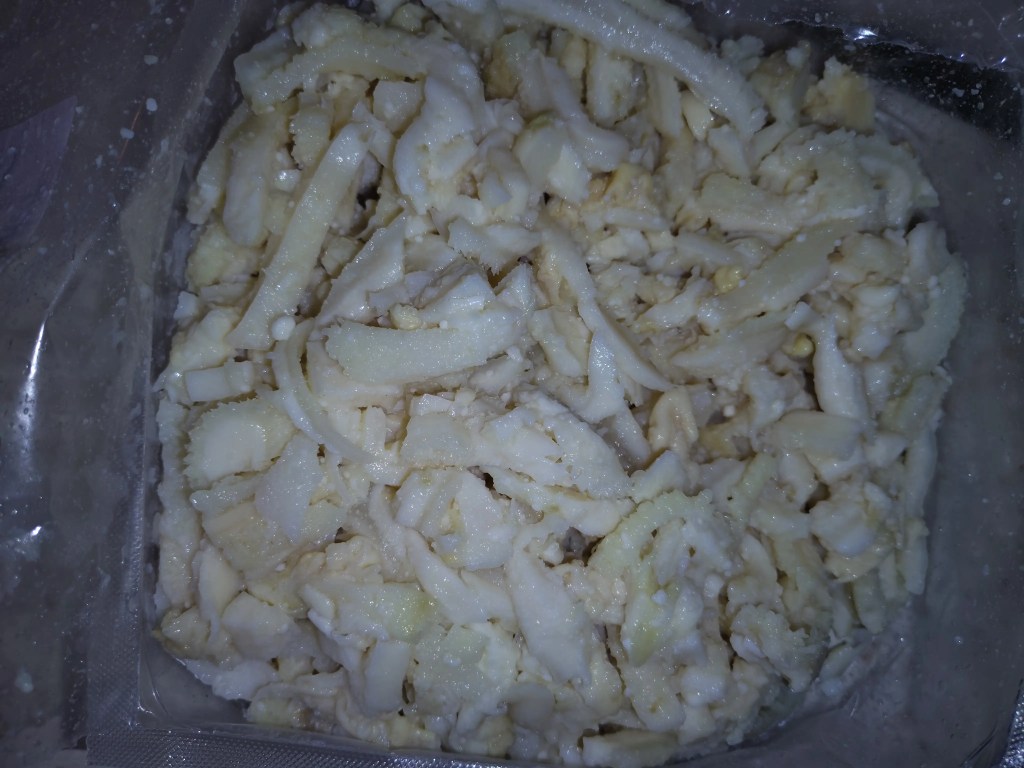 Pre-cooked beef tripe sliced into thin strips, prepared for Romanian tripe soup.